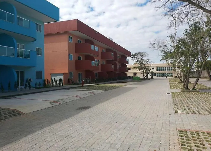 Flat com praia privativa e lazer total em Arraial